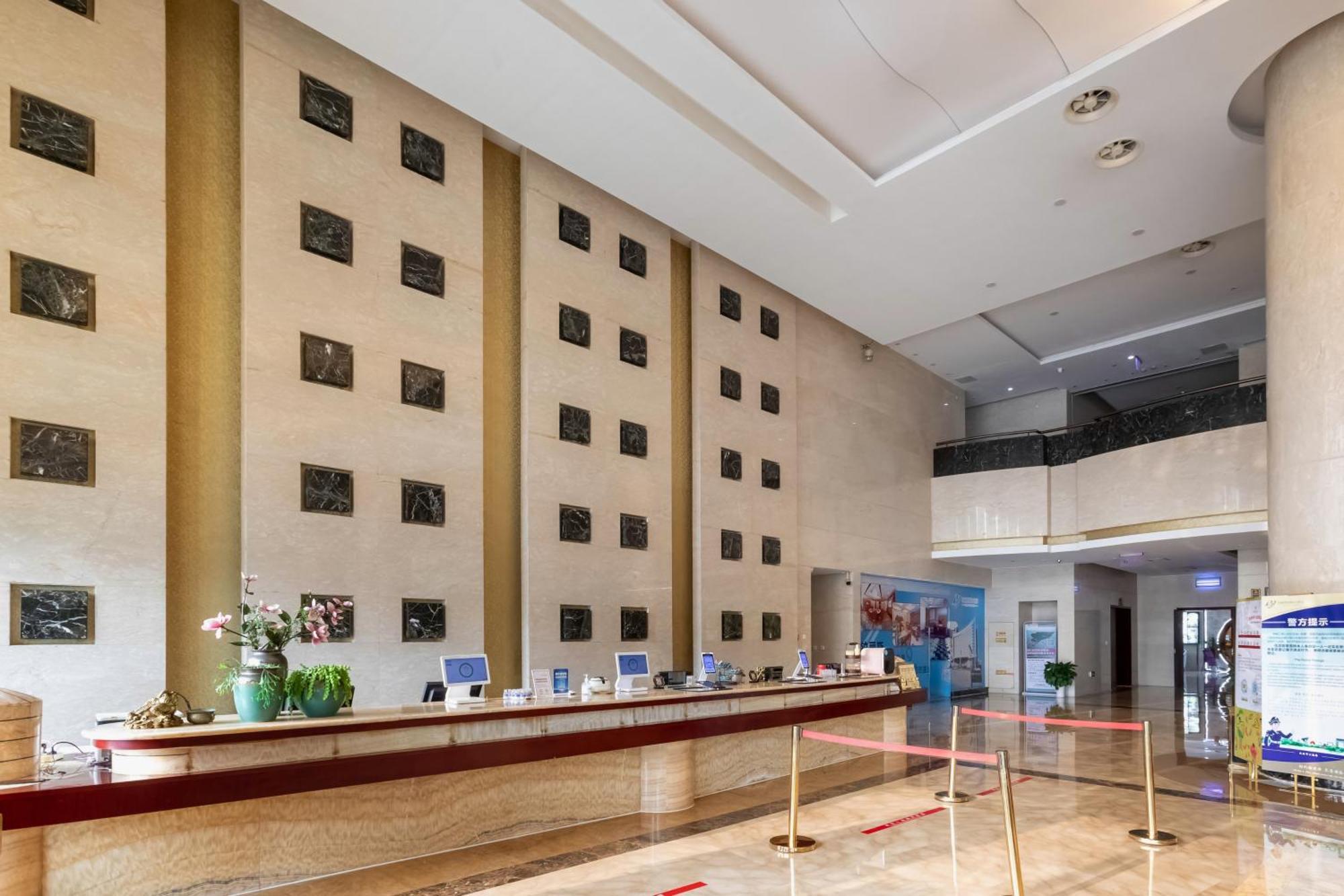 Bliss International Hotel Weihai Exterior foto