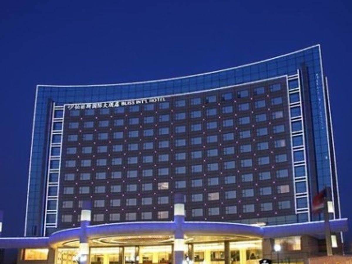 Bliss International Hotel Weihai Exterior foto